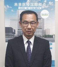西野課長写真.jpg